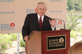 President Nicholson answers questions from the media<br>at the news conference announcing Robert Morris University's<br>purchase of the Island Sports Center.