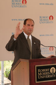 Vic Gregovits details the objectives of the Island Sports<br>Center during the news conference.