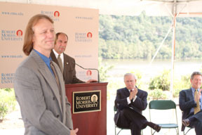 Vic Gregovits introduces Dave Hanson as the<br>general manager of the Robert Morris University<br>Island Sports Center.